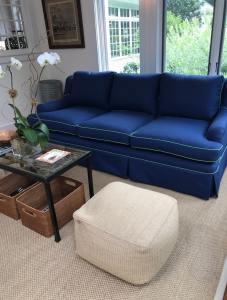 blue sofa white ottoman sun upholstery